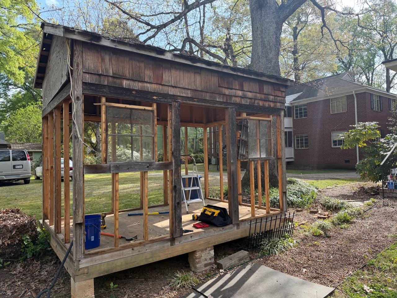 Wood outbuilding during dismantling